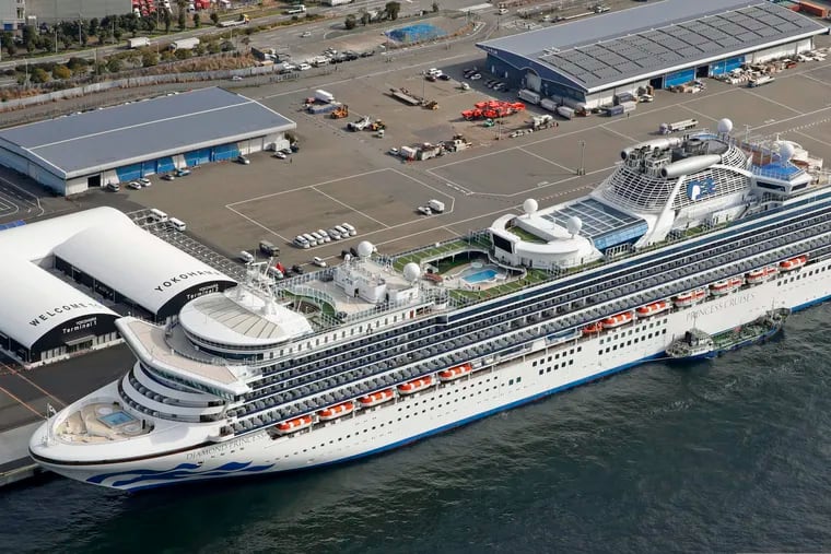 The cruise ship Diamond Princess is docked at Yokohama Port, near Tokyo, Friday, Feb. 7, 2020. Japan on Friday reported 41 new cases of a virus on the cruise ship that's been quarantined. About 3,700 people have been confined aboard the ship.