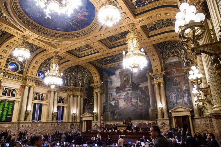 In this file photo from Nov. 19, 2019, state congressmen are seated in the Pennsylvania House of Representatives Chambers at the Pennsylvania Capitol in Harrisburg, Pa.
