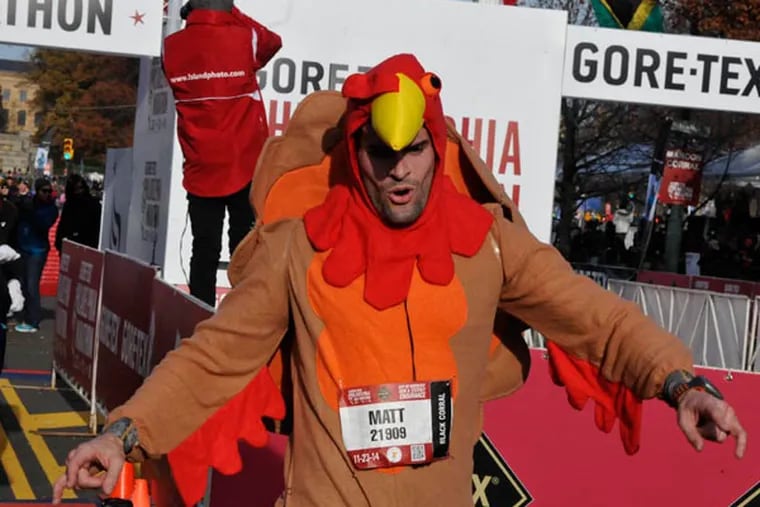 MATT CURTIS of Philadelphia, Pa. got into the Thanksgiving spirit dressed as a turkey for the half marathon. He finished in 1:52:03. (Dave DuBan / For Philly.com)