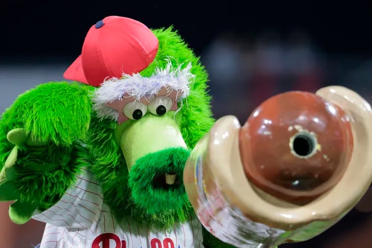 The Phillie Phanatic gets set to launch hot dogs during a game at Citizens Bank Park in September.