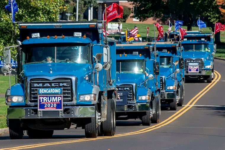 Part of a Trump caravan of trucks, cars, and bikes in Bucks County on Saturday. The rally drove from Newtown to Doylestown, Pa., in a critical county where Trump held his own in 2016 but where his support may be slipping.