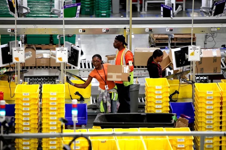 Workers at Amazon's Fulfillment Center  in San Bernardino, Calif., in 2013.