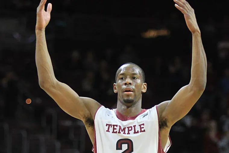 Temple's Will Cummings encourages the cheering of the fans. (Charles Fox/Staff Photographer)