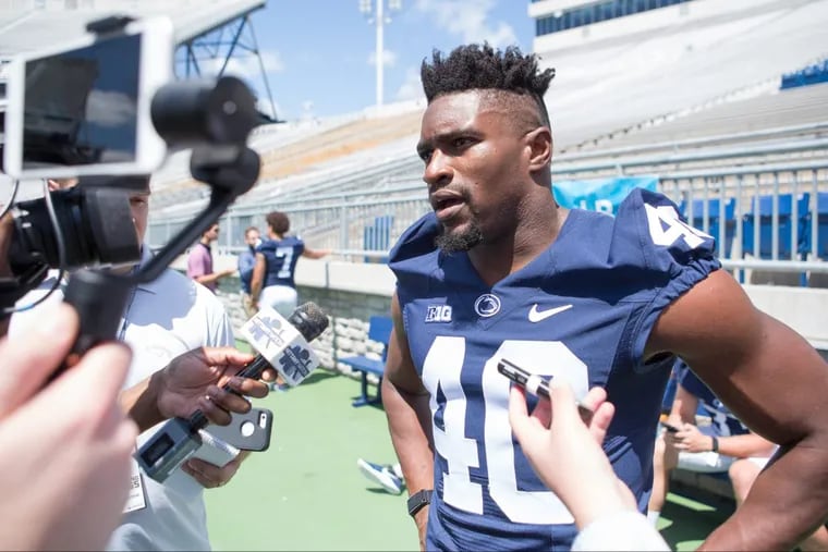 Jason Cabinda answers questions during media day at Penn State on Aug. 5.