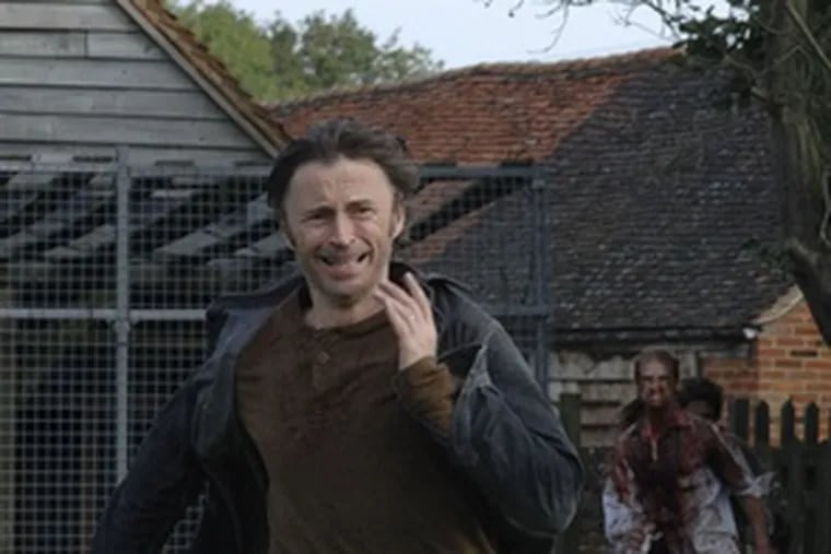 Don (Robert Carlyle) is chased by the Rage-infected.