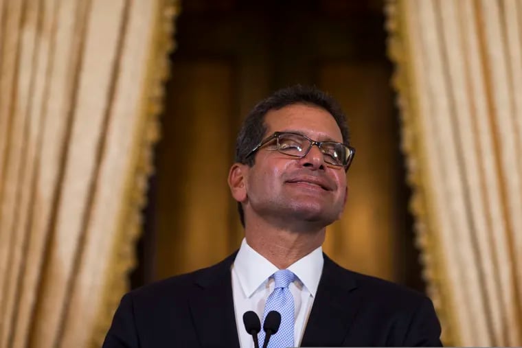 Pedro Pierluisi, sworn in as Puerto Rico's governor, smiles during a press conference in San Juan, Puerto Rico, Friday, Aug. 2, 2019.