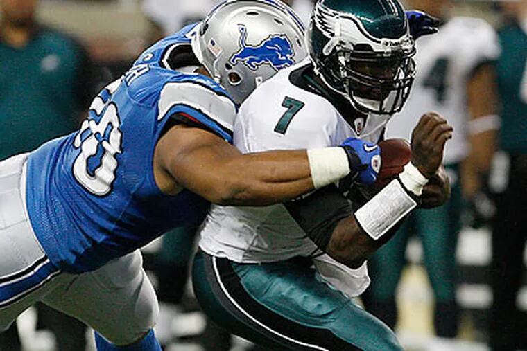 Ndamukong Suh and the Lions had Michael Vick under constant pressure. (David Maialetti/Staff Photographer)