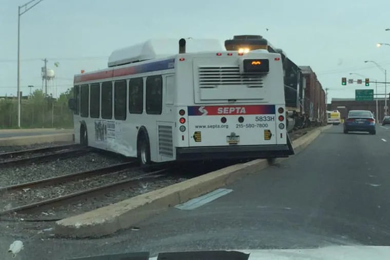 A SEPTA bus ran over a median during rush hour Tuesday afternoon, officials said. (Photo courtesy of Lauren Ferrett)