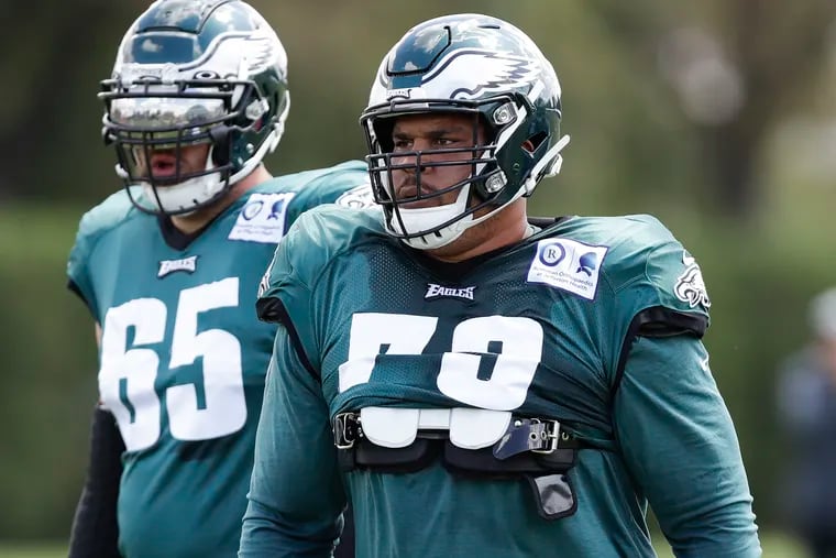 Eagles offensive linemen Brandon Brooks (right) and offensive tackle Lane Johnson during practice at the NovaCare Complex in South Philadelphia on Sunday, August 25, 2019