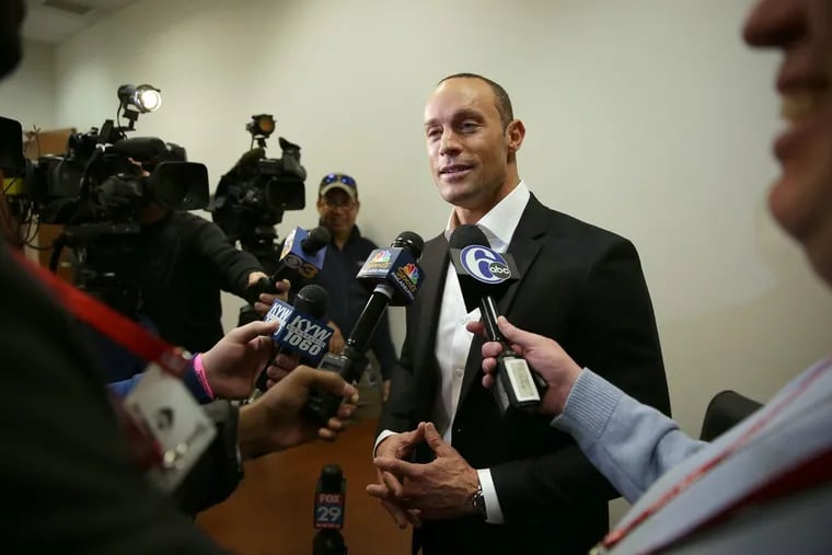 Phillies manager Gabe Kapler talking with the media in his office at Citizens Bank Park recently.