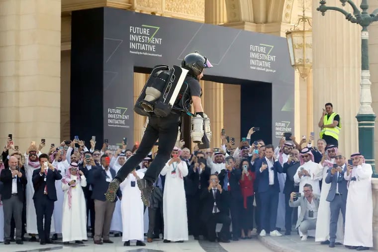 British inventor Richard Browning uses a jet pack to display his technology at the Future Investment Initiative forum in Riyadh, Saudi Arabia, Tuesday, Oct. 29, 2019.  (AP Photo/Amr Nabil)