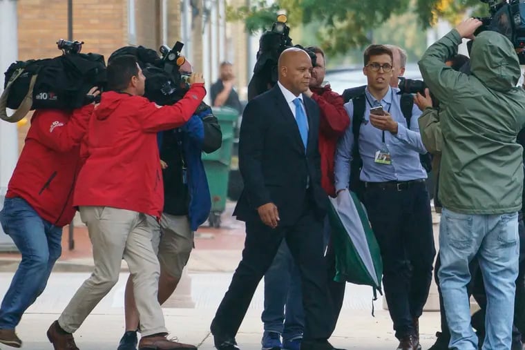 Atlantic City Mayor Frank Gilliam exits Federal Court in Camden, New Jersey, Thursday, October 3, 2019.  Gilliam Jr. pleaded guilty in federal court in Camden that day to wire fraud, admitting he defrauded a basketball club out of $87,000. (Jessica Griffin/The Philadelphia Inquirer via AP )