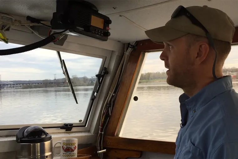 Captain Ian Robbins of the Chesapeake Bay Foundation pilots the Snowgoose near where the bay and Susquehanna River meet. April, 2017.