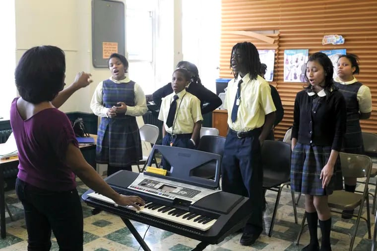 Cann works with her class. In addition to five days of instruction each week, students are brought into contact with established musical figures so they can begin to visualize success. (TOM GRALISH / Staff Photographer)