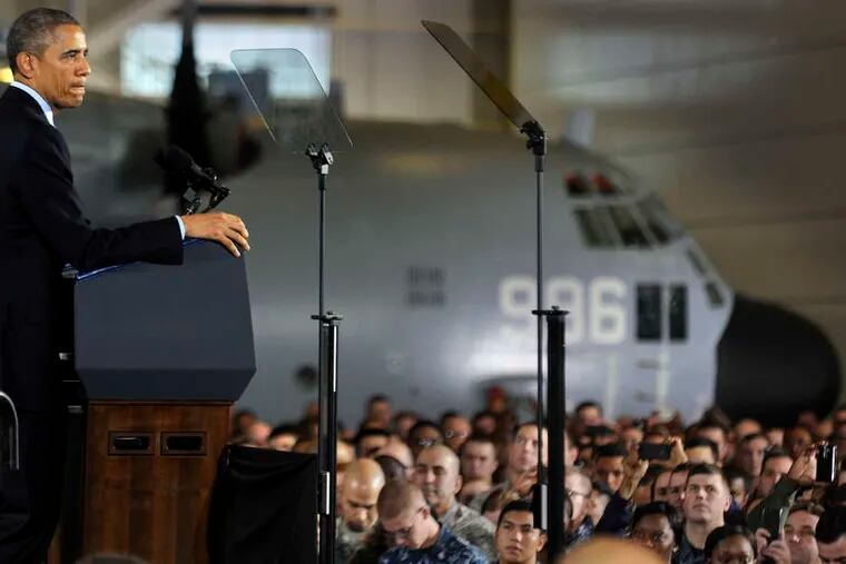 TOM GRALISH / STAFF PHOTOGRAPHER Obama speaks to troops yesterday at a New Jersey military base.