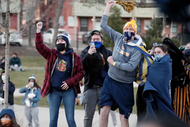 Drexel students celebrate as their men's and women's basketball teams go to the NCAAs.