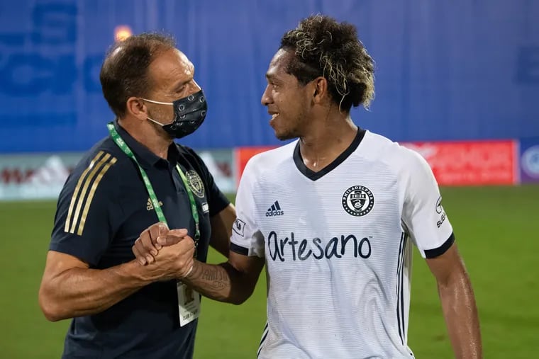 Union sporting director Ernst Tanner, left, congratulating midfielder José Andrés Martínez after the MLS tournament quarterfinal win over Sporting Kansas City. Martínez has been one of the Union's best players this year.