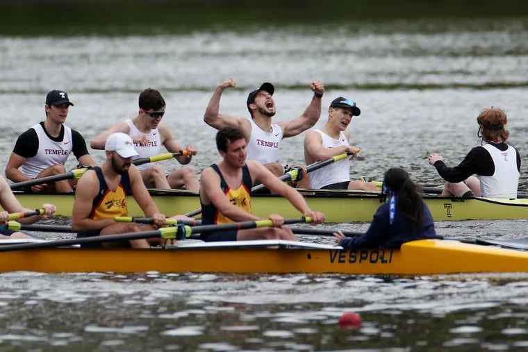 Temple rowers (rear) celebrate after beating Drexel to win the men's frosh/novice heavyweight eight final during the 82nd Annual Jefferson Dad Vail Regatta.