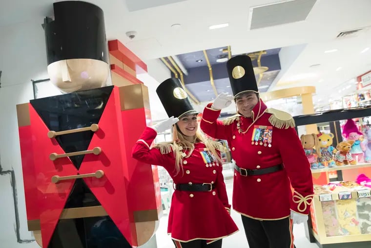 FAO Schwarz toy soldiers dressed in uniforms designed by model Gigi Hadid pose for a photo during a media preview of the new FAO Schwarz store at Rockefeller Center in New York.