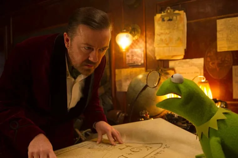 Ricky Gervais with Constantine the Kermit copy.