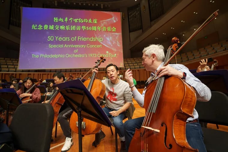Philadelphia Orchestra cellist John Koen (right) at rehearsal for a side-by-side concert with the China National Symphony Orchestra at the National Centre for the Performing Arts in Beijing. The concert celebrated the 50th anniversary of the Philadelphia Orchestra's first visit to China in 1973.