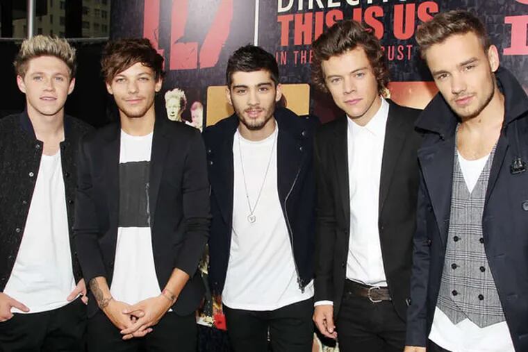 This image released by Starpix shows members of One Direction, from left, Niall Horan, Louis Tomlinson, Zayn Malik, Harry Styles, and Liam Payne. (AP Photo/Starpix, Dave Allocca)