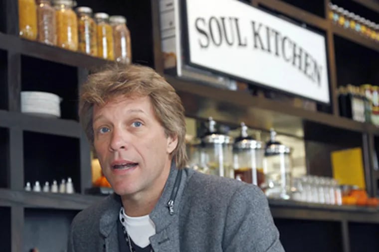 Jon Bon Jovi's Soul Kitchen is part of an effort to redefine how hunger is addressed. (Mel Evans / AP)
