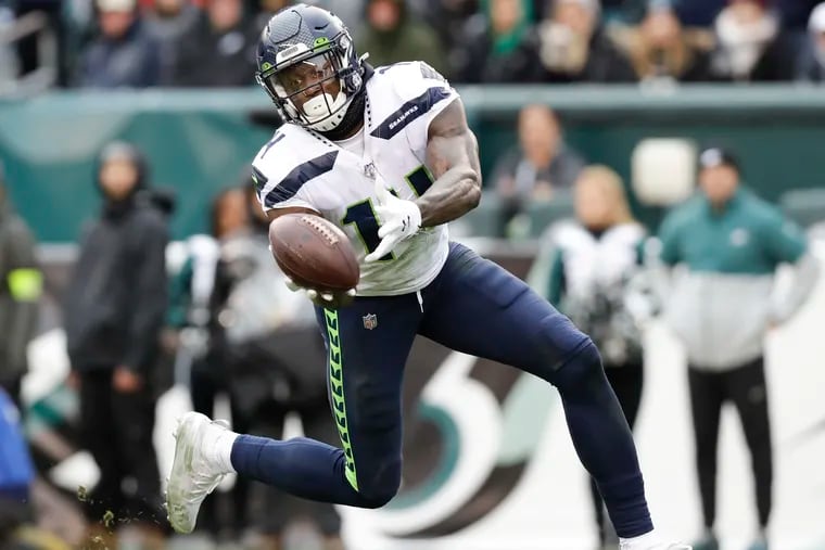 Seahawks wide receiver D.K. Metcalf attempts to catch the football against the Eagles in November.