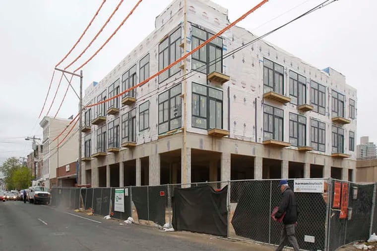 Townhouses go up next to older ones at Second and Spring Garden Streets. The area has a wide range of properties - from old to new and high end.