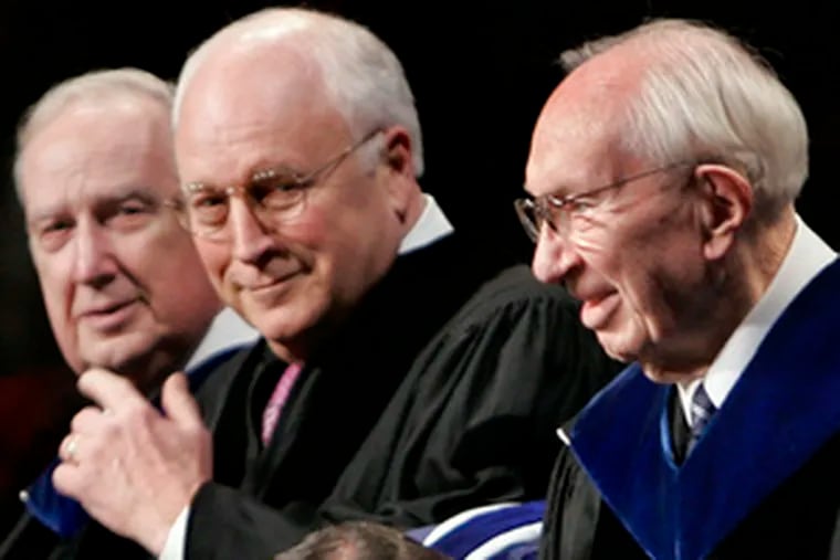 Brigham Young alumni Gwen Dutcher protests. At right, Cheney greets the Mormon church president, Gordon B. Hinckley (right).