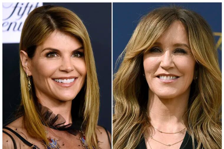 FILE - This combination photo shows actress Lori Loughlin at the Women's Cancer Research Fund's An Unforgettable Evening event in Beverly Hills, Calif., on Feb. 27, 2018, left, and actress Felicity Huffman at the 70th Primetime Emmy Awards in Los Angeles on Sept. 17, 2018. Loughlin and Huffman are among at least 40 people indicted in a sweeping college admissions bribery scandal. Both have been charged with conspiracy to commit mail fraud and wire fraud and are scheduled to make their initial appearances in Boston federal court. (AP Photo, File)