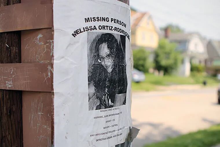 A missing poster faces the site police searched for the body of missing person Melissa Ortiz-Rodriguez, in Collingdale, on Tuesday, June 25, 2013. ( Stephanie Aaronson / Philly.com )