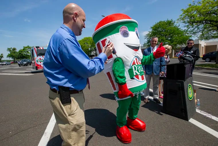 The Rita's Water Ice mascot "gets vaccinated" at the Neshaminy Mall in Bensalem on Thursday, May 20, 2021.