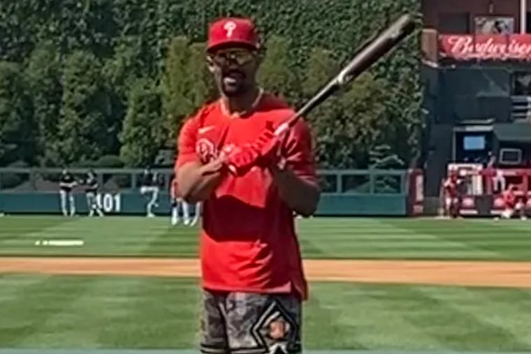 Eagles quarterback Jalen Hurts at Phillies batting practice on Tuesday