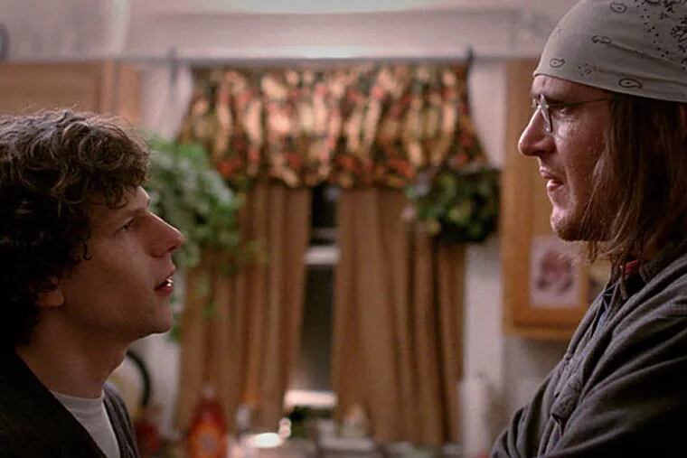 Jason Segel, right, plays David Foster Wallace, with Jesse Eisenberg, as David Lipsky, in &quot;The End of the Tour,&quot; which premiered Friday.