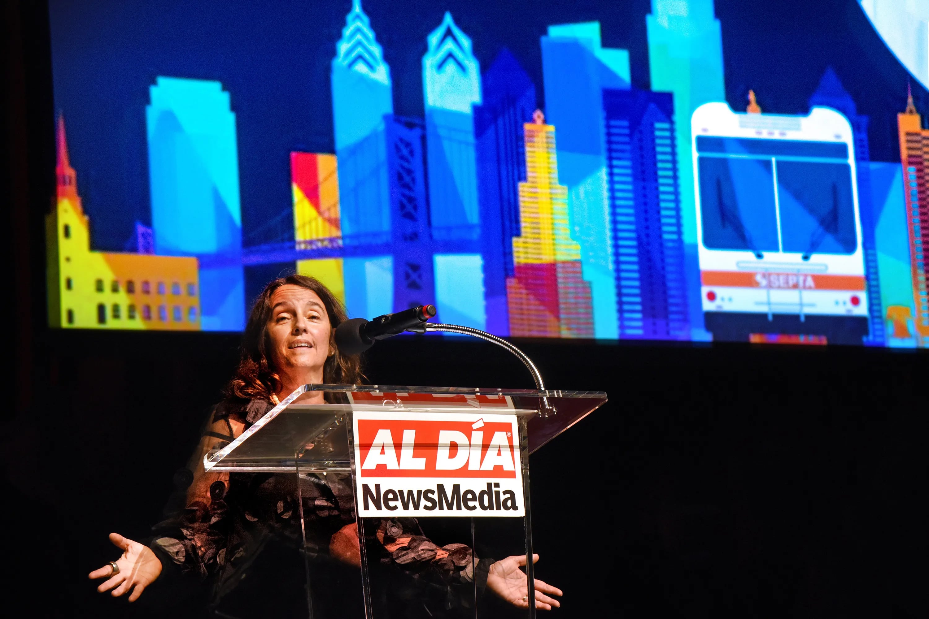 Producer Alba Martinez speaks onstage at the Perelman Theater in 2022 before the premiere of her short film, La Guagua 47. She will serve as Philadelphia's next commerce director.