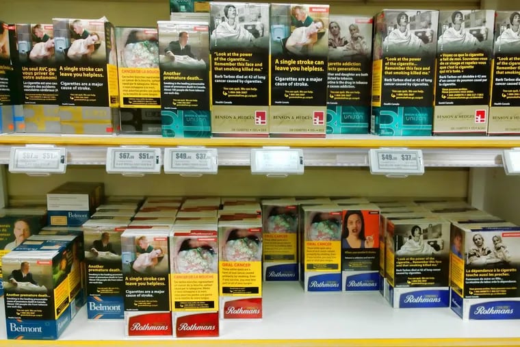 Canadian cigarette cartons with disturbing and graphic images, part of a campaign to deter smoking.