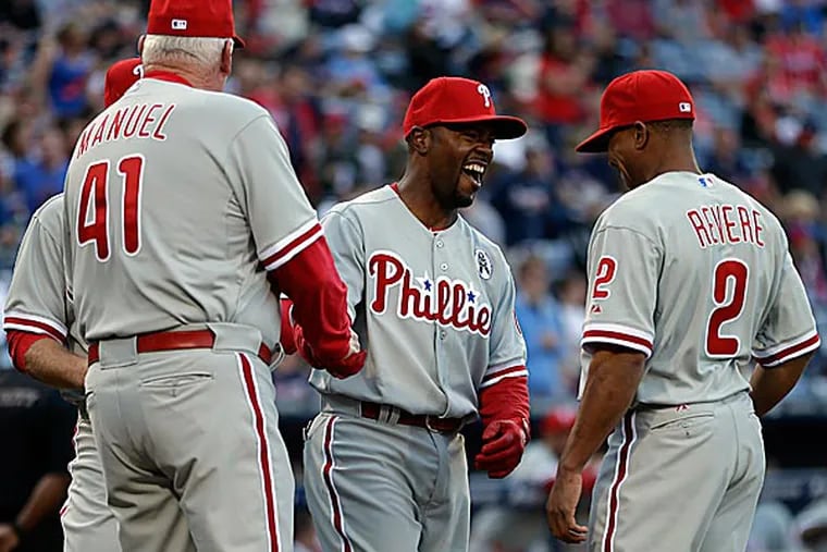 Washington and Atlanta make winning a division title tough for Jimmy Rollins and the Phillies. (David Goldman/AP)