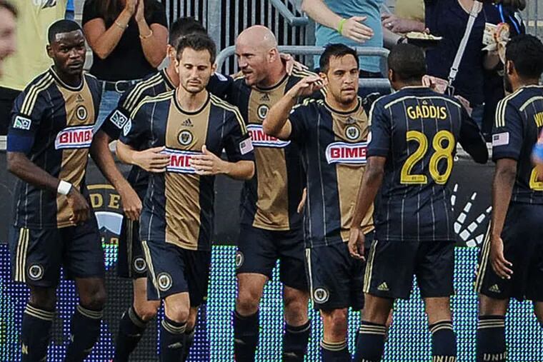 Philadelphia Union players celebrate a goal by Philadelphia Union forward Sebastien Le Toux (11) during the first half of the match against the Montreal Impact at at PPL Park. (John Geliebter/USA Today)