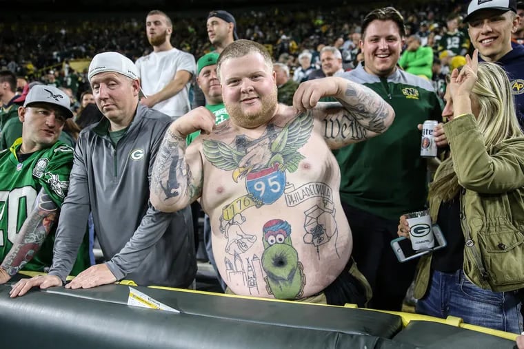 Eagles fan Ron Dunphy from Bridesburg, Pa. shows off his Philly Phanatic tattoo at Lambeau Field on the night the Eagles beat the Packers 34-7, on Thursday, September 26, 2019.
