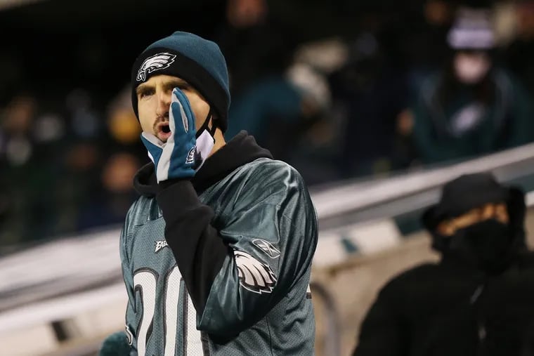 An Eagles fan boos at the end of the second quarter on Sunday.