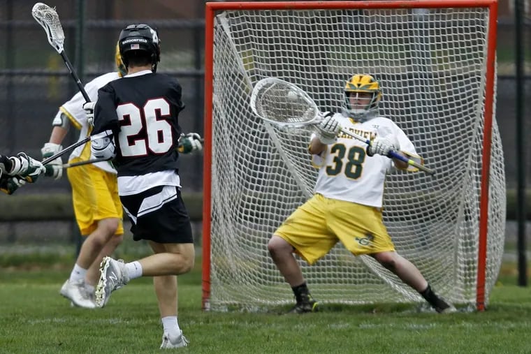 Haddonfield’s Aiden Blake (26) scores as Clearview’s Chase McFeely defends in a game last season.