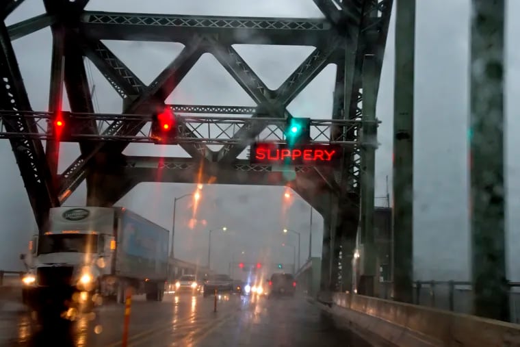 In this June 19, 2017 a severe-thunderstorm moves through the region during evening drive time along the Tacony-Palmyra Bridge.