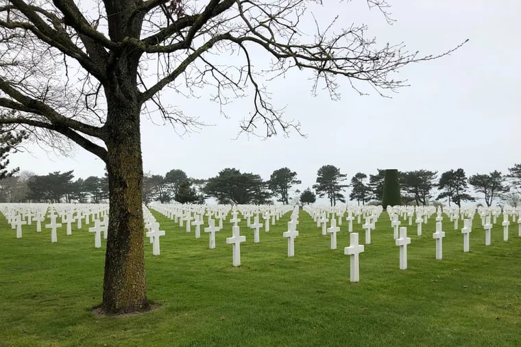 There are 9,380 Americans, including four women, buried at the American Cemetery in Normandy, on a bluff overlooking the English Channel.