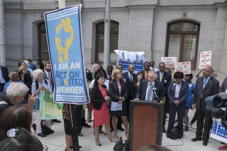 Attorney Michael Churchill of the Public Interest Law Center of Philadelphia, speaks at a rally outside Philadelphia City Hall September 13, 2016 after the PA Supreme Court heard arguments in a case against the Commonwealth over school funding.