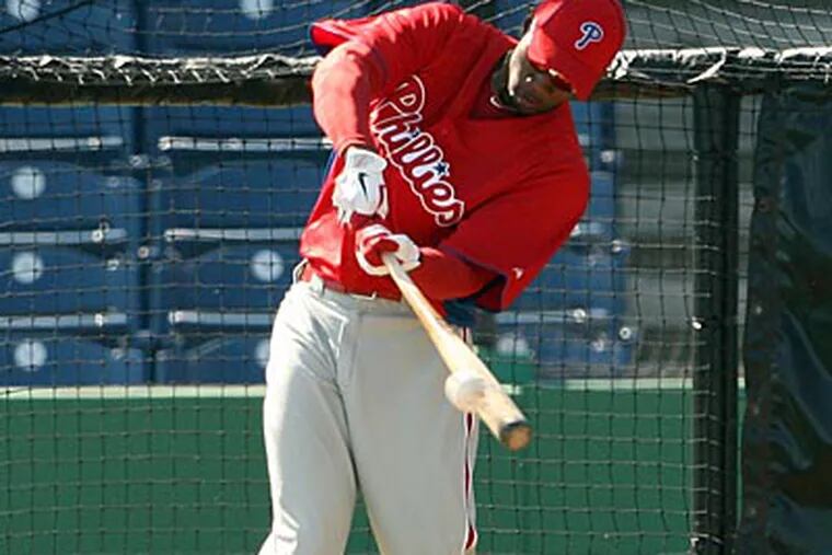 Domonic Brown had a rough spring training before suffering an injury to his right hand. (Yong Kim/Staff Photographer)
