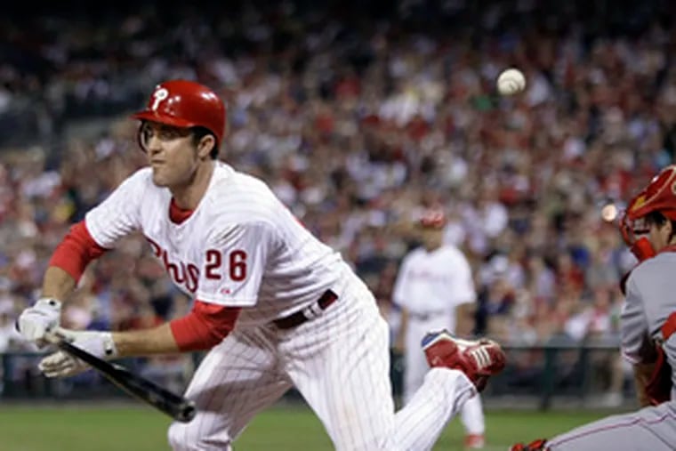 Chase Utley dances after being hit by pitch on right foot.