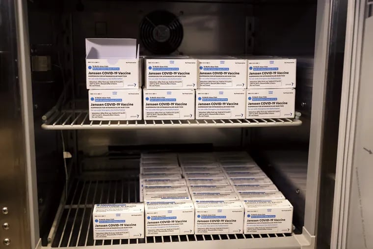 Johnson & Johnson COVID-19 vaccine sits in a refrigerator at South Shore University Hospital in New York last month.