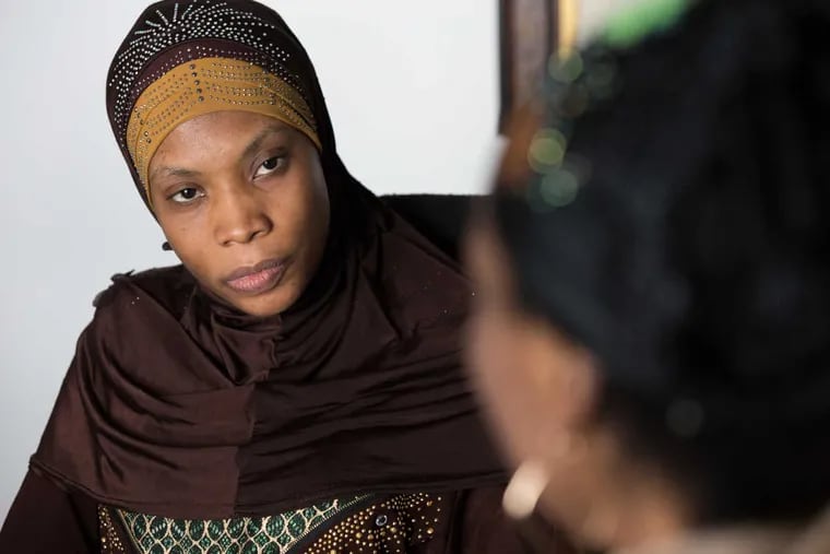 Salimatou Sy, an immigrant from Mali who underwent Female Genital Mutiliation (FGM) as an infant, is shown here speaking with an unidentified victim of FGM during an interview at African Family Health Org (AFHO), in West Philadelphia. Sy is a health educator at AFHO, an organization which helps African immigrants access health services.