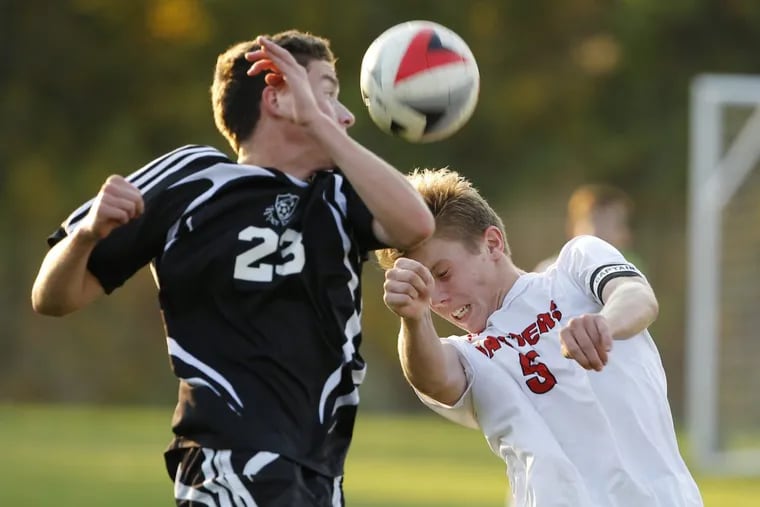 Upper Dublin’s #23, Tom Hiltwine, left, and Hatboro-Horsham’s #5, Colin Bateman battle for the ball in the second half of the game. Upper Dublin High School varsity boys soccer team played Hatboro-Horsham to a 2-2 tie in a double overtime , golden goal game on Tuesday October 18, 2016 10/18/2016 MICHAEL BRYANT / Staff Photographer
